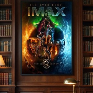 May include: IMAX movie poster for Mortal Kombat, featuring characters in action poses against a fiery and icy backdrop. The poster includes the text "GET OVER HERE!" and the IMAX logo, displayed in a wooden-paneled room with bookshelves.