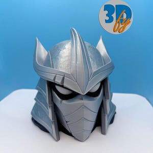 May include: A set of three ceramic mugs with a speckled, matte finish. The mugs are in shades of cream, light gray, and dark gray. Each mug has a simple, minimalist design, perfect for coffee or tea.