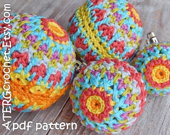 May include: Four colorful crocheted ornaments with a geometric pattern. The ornaments are made with a variety of colors, including red, orange, yellow, green, blue, and purple. The ornaments are all different sizes and shapes.