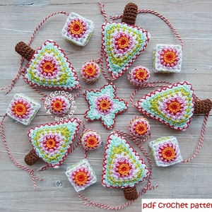 May include: A set of 10 crocheted Christmas ornaments in various shapes, including trees, stars, and squares. The ornaments are made with a variety of colors, including red, green, white, and pink. The ornaments are all strung with red and white twine. The text "pdf crochet pattern" is visible at the bottom of the image.
