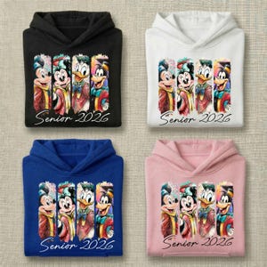 May include: Four hooded sweatshirts in black, white, blue, and pink. Each features a graphic of Mickey Mouse, Minnie Mouse, Donald Duck, and Goofy wearing graduation caps, with the text "Senior 2026" printed in a cursive script below the characters.