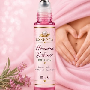 May include: A 10ml clear pink glass roll-on bottle with a silver metal roller ball. The label features the text ESSENYA Hormone Balance ROLL-ON, with subtext reading Balance, Calm, Mood Support, and Cycle Support, accented by a pearl icon.