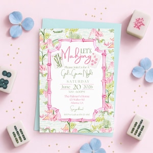 May include: A pink invitation for a Mahjong Girls' Game Night, featuring a bamboo frame and floral accents. The invitation includes the text "Let's Mahjong" and event details. Mahjong tiles and blue flower petals surround the invitation on a pink surface.