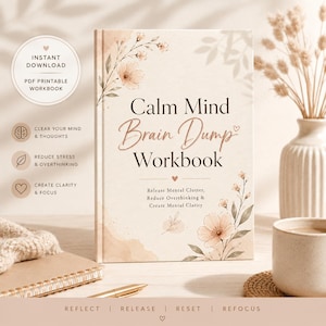 May include: A rectangular workbook titled Calm Mind Brain Dump Workbook with a beige cover featuring delicate floral illustrations in soft brown and pink tones. The text includes Release Mental Clutter, Reduce Overthinking & Create Mental Clarity.