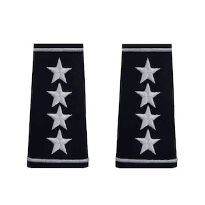 May include: Two dark blue shoulder boards, each featuring four white embroidered stars. The edges are trimmed with silver thread. These military epaulettes are designed for a uniform.