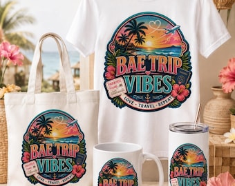 May include: A white t-shirt, a canvas tote bag, a ceramic mug, and a metal tumbler, each featuring a colorful graphic of a tropical beach sunset with palm trees, a plane, and the text BAE TRIP VIBES, LOVE, TRAVEL, REPEAT, and PARADISE FOUND.