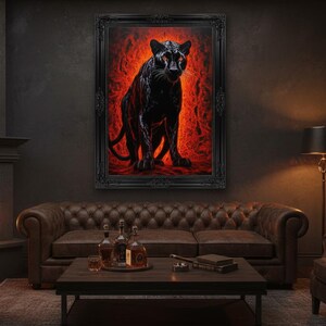 May include: A framed artwork depicting a black panther against a fiery red background. The panther is the focal point, set within an ornate black frame. The room features a leather sofa, fireplace, and a dark, moody aesthetic.