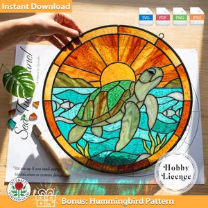 May include: A circular stained glass panel depicting a sea turtle in turquoise water with a sunset. The panel has a black border and the text "Sea Turtle Panel" and "Instant Download". The image also includes a "Hobby Licence" badge.