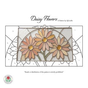 May include: Stained glass pattern featuring three daisy flowers in shades of peach, yellow, and orange. The design includes stems and a clear background, with the text "Daisy Flowers" and "A Pattern by QGcrafts".