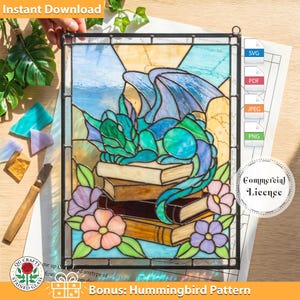 May include: Stained glass panel depicting a dragon on books, surrounded by flowers. The dragon is in blue and green hues. The panel includes the text "Instant Download" and "Commercial Licence".