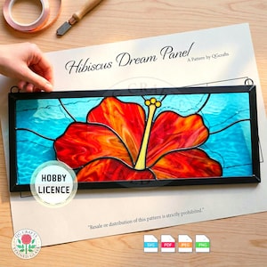 May include: A white ceramic mug with a black handle and the text "But First, Coffee" in a bold, black font. The mug is set against a blurred background, suggesting a cozy setting.