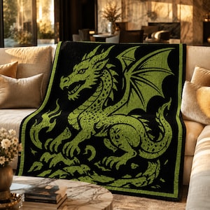 May include: A rectangular throw blanket featuring a high-contrast design of a lime green dragon on a solid black background. The dragon is depicted in a side profile with wings spread, sharp claws, and a textured scale pattern throughout its body.