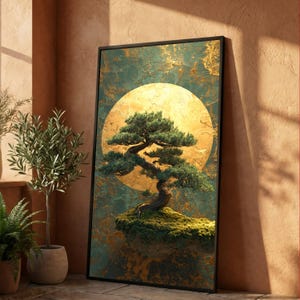 May include: A framed art print featuring a bonsai tree with green foliage, set against a golden yellow full moon. The background has a textured teal and gold design. The artwork is displayed in a room with potted plants.