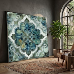 May include: A large square wall art piece featuring a symmetrical, ornate floral pattern in shades of deep blue, teal, sage green, and white. The design displays intricate, swirling scrollwork and layered petal motifs with a textured appearance.