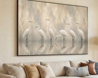 May include: A rectangular wall art print featuring six white egrets standing in shallow water. The birds are depicted in various poses against a textured, neutral-toned background with soft beige and grey brushstrokes and faint reed silhouettes.