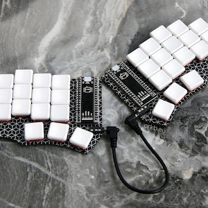 Cantor Remix-keyboard: Ergonomiskt lågprofilerat delat keyboard, kompatibelt med ampuller