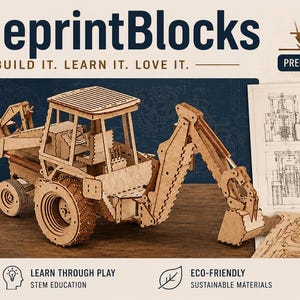 May include: A laser-cut wooden model of a backhoe loader construction vehicle. The model features detailed wheels, a front bucket, and a rear excavator arm. Beside the model is a technical blueprint drawing of the vehicle and a pencil.