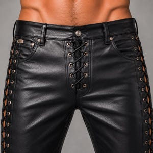 May include: Black leather pants featuring a front lace-up closure with silver-toned metal eyelets and matching lace-up detailing along both outer side seams. The pants include a standard waistband with belt loops and a single metal button closure.