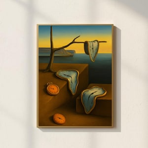 May include: A framed art print depicting a surreal landscape with melting clocks draped over a bare tree branch and brown geometric blocks. The scene features a blue sea and a yellow horizon, with two circular orange pocket watches resting nearby.