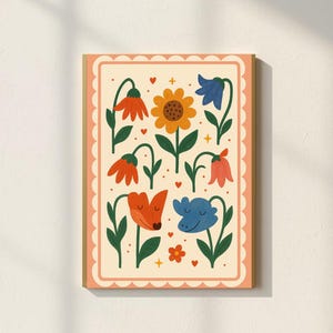 May include: A framed floral art print featuring stylized flowers in orange, yellow, blue, and red. The flowers have green stems and leaves, set against a cream background with a scalloped border. Small hearts and crosses are scattered throughout the design.
