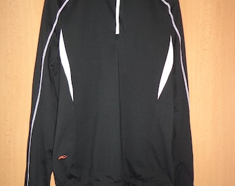 Zwart-witte trekkingblouse van Kjus Systems met halve rits en korte rits, maat 40/l