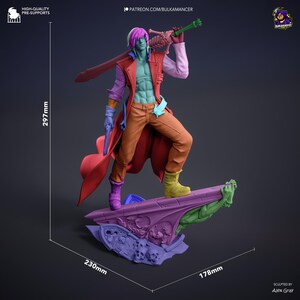 May include: A multi-colored resin figurine of a character with pink hair, wearing a red coat, tan pants, and yellow boots, holding a sword and pistol. The base features skulls and architectural details, measuring 297mm by 230mm by 178mm.