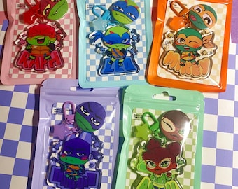 2.5" ROTTMNT Star Charm Keychains + 1.25" Button Pins