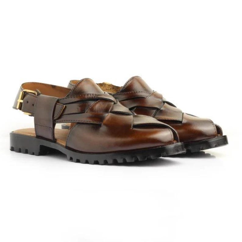 Handmade burnished brown leather for men featuring a woven closed-toe upper, adjustable slingback buckle, peep-toe design, and rugged lug sole, ideal for summer, vacations, walking, and smart casual wear.