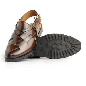Handmade burnished brown leather for men featuring a woven closed-toe upper, adjustable slingback buckle, peep-toe design, and rugged lug sole, ideal for summer, vacations, walking, and smart casual wear.