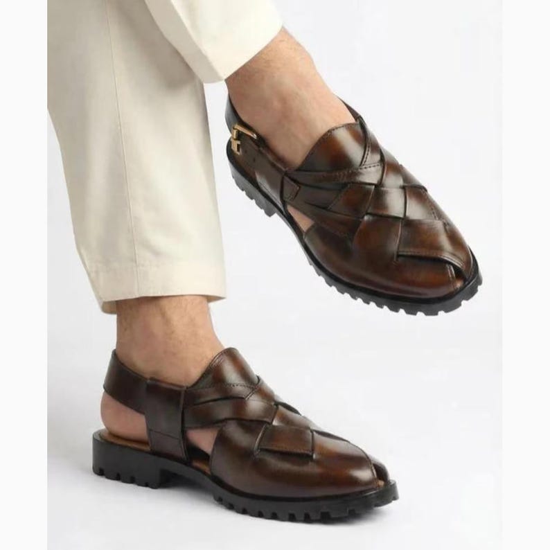 Handmade burnished brown leather for men featuring a woven closed-toe upper, adjustable slingback buckle, peep-toe design, and rugged lug sole, ideal for summer, vacations, walking, and smart casual wear.