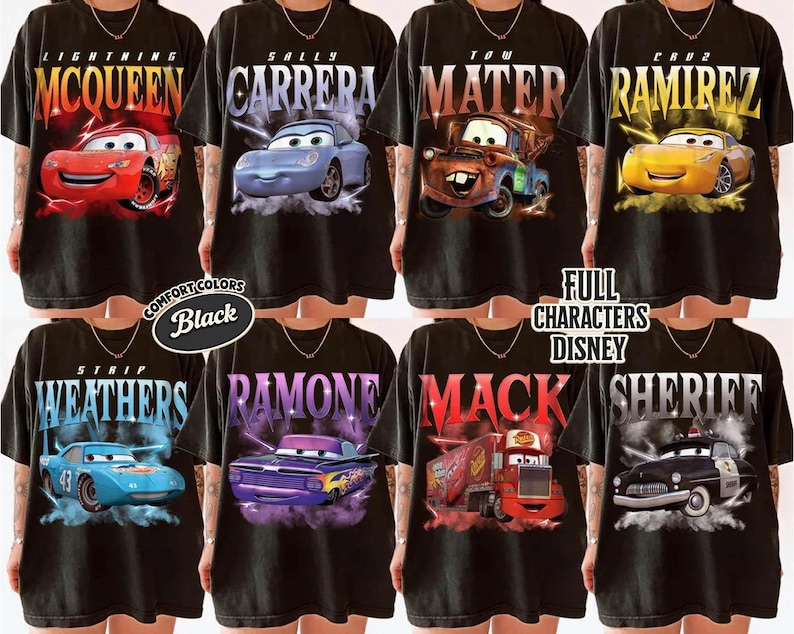 May include: Black t-shirts featuring various characters from the Disney Cars movie. Designs include Lightning McQueen, Sally Carrera, Tow Mater, Cruz Ramirez, Strip Weathers, Ramone, Mack, and Sheriff. The text "Comfort Colors Black" and "Full Characters Disney" are also visible.