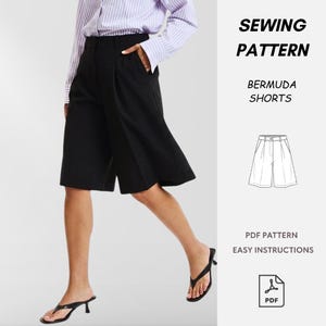 May include: A set of three ceramic mugs with a speckled, matte finish. The mugs are in shades of cream, light grey, and dark grey. Each mug has a simple, minimalist design, ideal for coffee or tea.