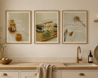 May include: Three framed wall art prints displayed in a kitchen. The first print features the text "Pour. Sip. Breathe." The second print displays "This is our place." The third print shows "Home begins here." Each print features photography of food and drink.