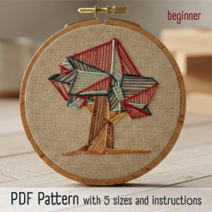 May include: A beginner-level embroidery hoop featuring a geometric tree design. The tree is stitched with red, blue, and brown thread on a tan fabric. The text "PDF Pattern with 5 sizes and instructions" is at the bottom.