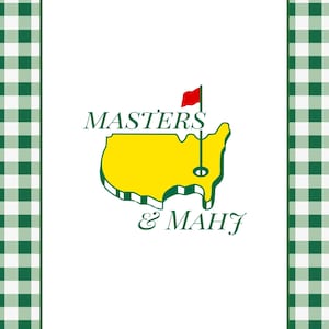 May include: A white card with a green and white checkered border. The card features the words "MASTERS & MAHJ" in a dark green font, with a yellow outline of the state of Georgia and a red flag.