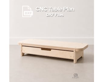 May include: A light-colored wooden low-profile table with a single drawer featuring a cutout handle. The text CNC Table Plan DXF Files is displayed above the table, and a logo with the letters CR and the text CRART PLANS is in the bottom corner.