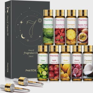 May include: A set of nine fragrance oil bottles with fruit labels, including watermelon, strawberry, and pineapple. The bottles are displayed with a box that reads "Diary of Fragrance Oils". Each bottle is 10ml or 0.33 fl. oz.
