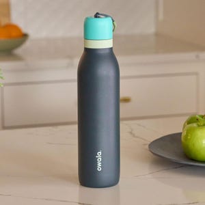 Personalized 18oz Owala FreeSip Twist stainless steel water bottle with laser engraved name, Travel-friendly laser engraved water bottle.
