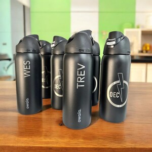 Personalized 18oz Owala FreeSip Twist stainless steel water bottle with laser engraved name, Travel-friendly laser engraved water bottle.
