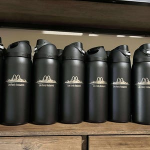 Personalized 18oz Owala FreeSip Twist stainless steel water bottle with laser engraved name, Travel-friendly laser engraved water bottle.