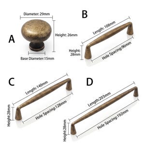 May include: Four antique brass hardware pieces labeled A, B, C, and D. A is a round knob with a 29mm diameter, 26mm height, and 15mm base. B, C, and D are handles with lengths of 108mm, 140mm, and 203mm, all featuring a 28mm height and varying hole spacings.