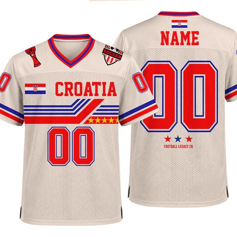 May include: A beige mesh jersey featuring red and blue accents, the text CROATIA, the number 00, a soccer emblem, and the Croatian flag. The back displays the text NAME, the number 00, the Croatian flag, and the text FOOTBALL LEGACY 26 with stars.