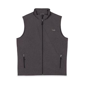 May include: A charcoal gray vest with a full-length zipper and a stand-up collar. The vest has two zippered pockets and a small logo on the chest. The vest is sleeveless and made of a textured fabric.
