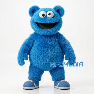 May include: A full-body shot of a blue plush character with large white eyes and a wide open mouth. The character has blue fur, small ears, and is wearing blue sneakers with white stripes. The character is standing upright.