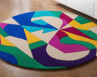 Tappeto rotondo in lana trapuntato a mano – Design geometrico astratto dai colori vivaci (Prodotto in India)