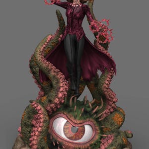 Peut inclure: Figurine détaillée d'un personnage en tenue bordeaux, debout sur une créature avec des tentacules et un grand œil. La figurine tient des vrilles d'énergie rouge. La base est un mélange de vert, de rose et de marron.