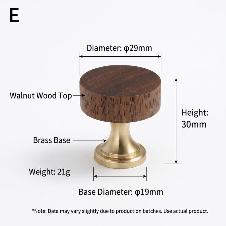 May include: A round cabinet knob with a dark brown walnut wood top and a gold-toned brass base. The knob has a diameter of 29mm, a height of 30mm, a base diameter of 19mm, and a weight of 21g. The image includes the text E, Walnut Wood Top, Brass Base, Diameter: 29mm, Height: 30mm, Base Diameter: 19mm, Weight: 21g.