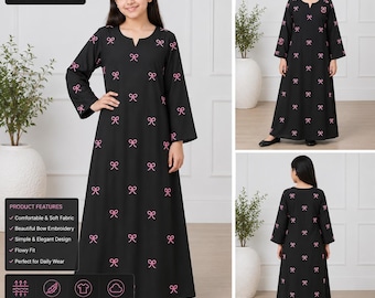 May include: A black floor-length dress featuring a repeating pattern of small pink embroidered bows, long sleeves, and a notched neckline. The garment has a length of 42 inches. The design is consistent across the front and back views.