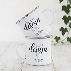 Enamel Mug Mockup Set | Two white metal mugs with silver rim | Modern stackable design with plant background
