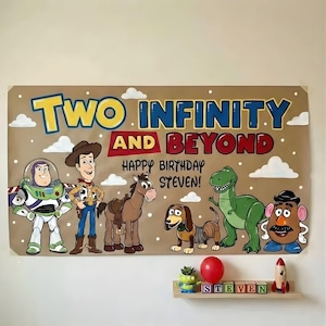 May include: A large banner featuring characters from the movie Toy Story, with the text "TWO INFINITY AND BEYOND" and "HAPPY BIRTHDAY STEVEN!". The banner includes illustrations of Buzz Lightyear, Woody, and other characters.